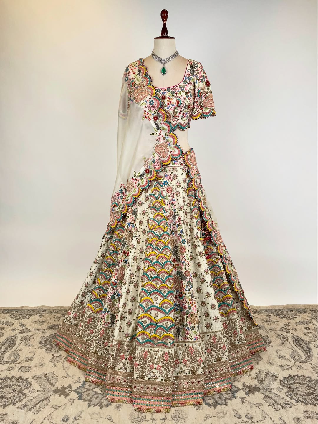 BEIGE RESHAM AND DORI HAND-EMBROIDERED LEHENGA EMBELLISHED WITH MULTI-COLOURED PEARLS