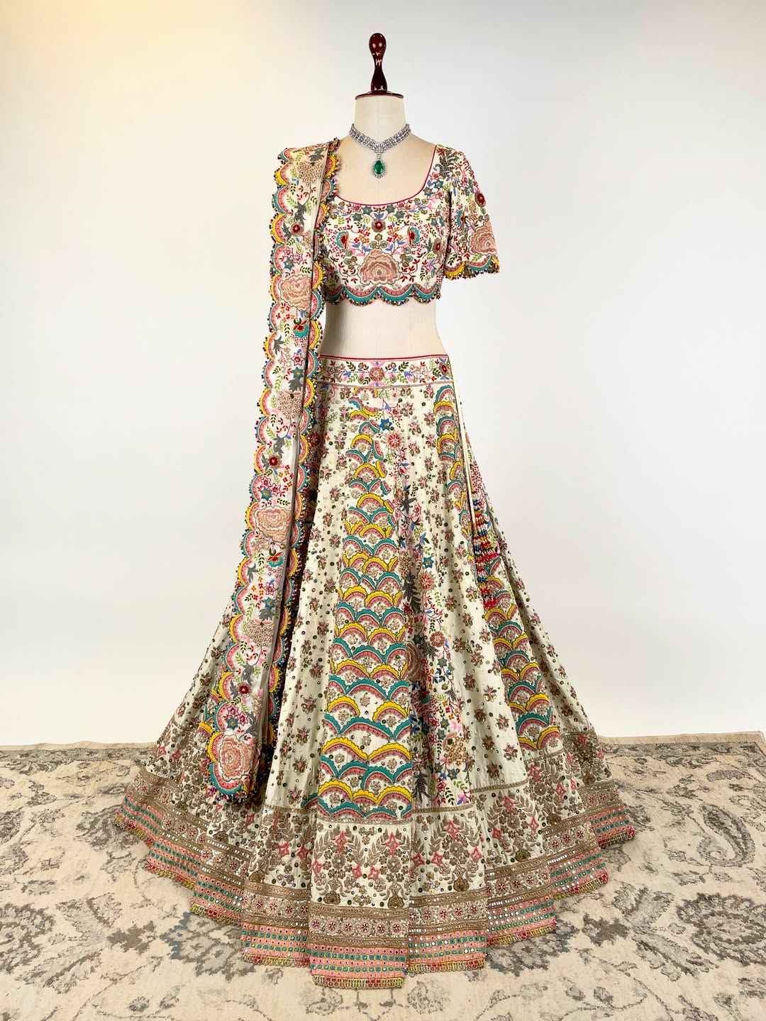 BEIGE RESHAM AND DORI HAND-EMBROIDERED LEHENGA EMBELLISHED WITH MULTI-COLOURED PEARLS