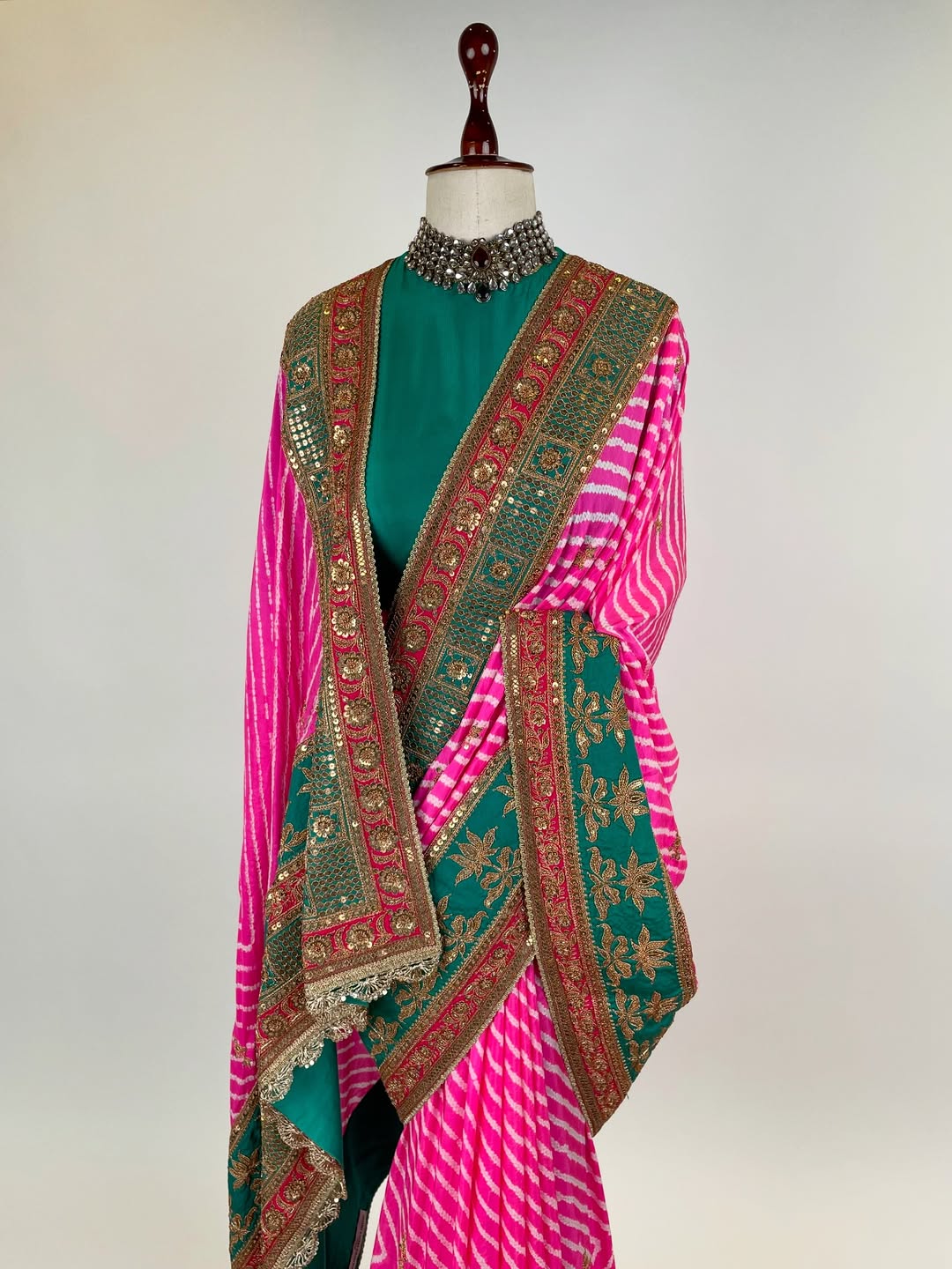 GREEN TEAL AND FUCHSIA PINK LEHERIYA RAI BANDHEJ GEORGETTE SAREE IN HERITAGE BRASS MARODI WORK