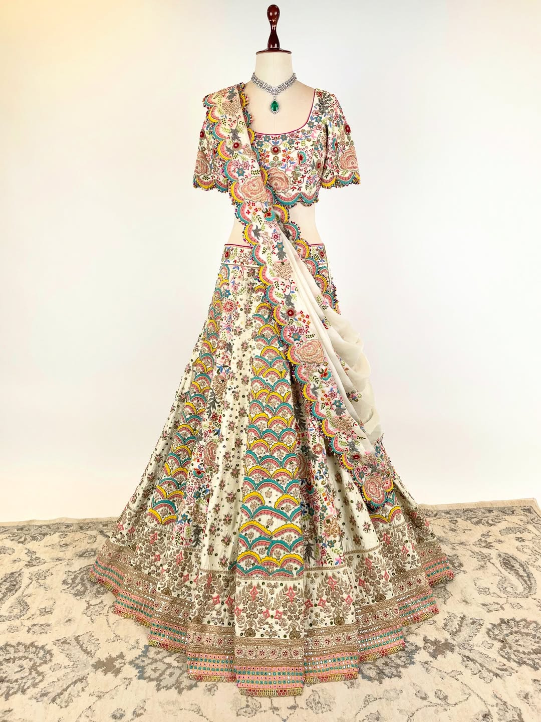 BEIGE RESHAM AND DORI HAND-EMBROIDERED LEHENGA EMBELLISHED WITH MULTI-COLOURED PEARLS
