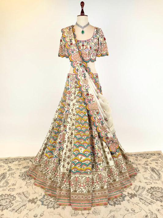 BEIGE RESHAM AND DORI HAND-EMBROIDERED LEHENGA EMBELLISHED WITH MULTI-COLOURED PEARLS