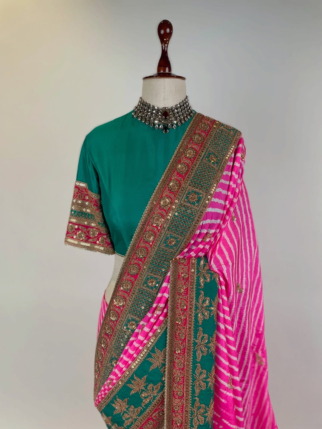 GREEN TEAL AND FUCHSIA PINK LEHERIYA RAI BANDHEJ GEORGETTE SAREE IN HERITAGE BRASS MARODI WORK