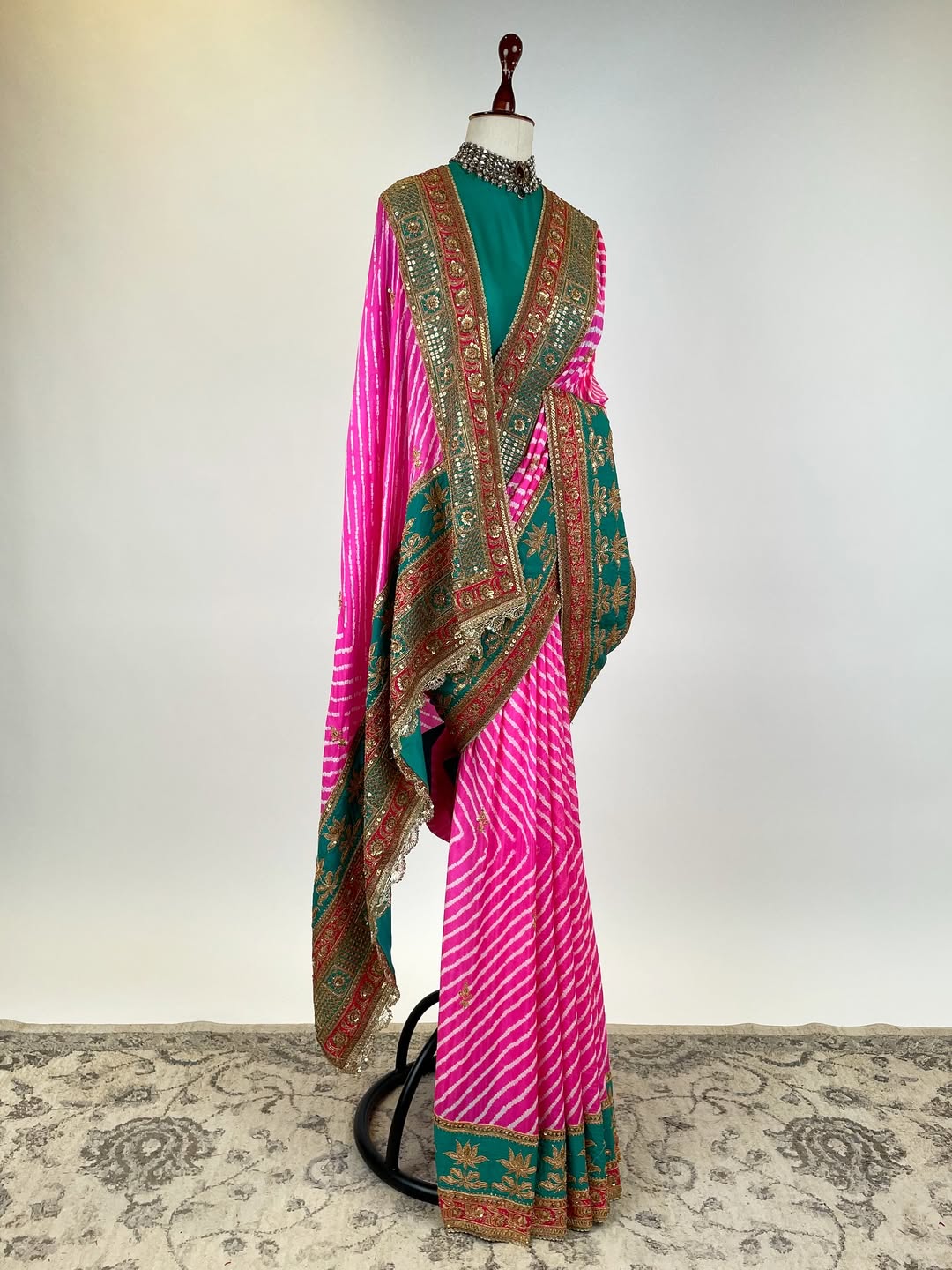 GREEN TEAL AND FUCHSIA PINK LEHERIYA RAI BANDHEJ GEORGETTE SAREE IN HERITAGE BRASS MARODI WORK