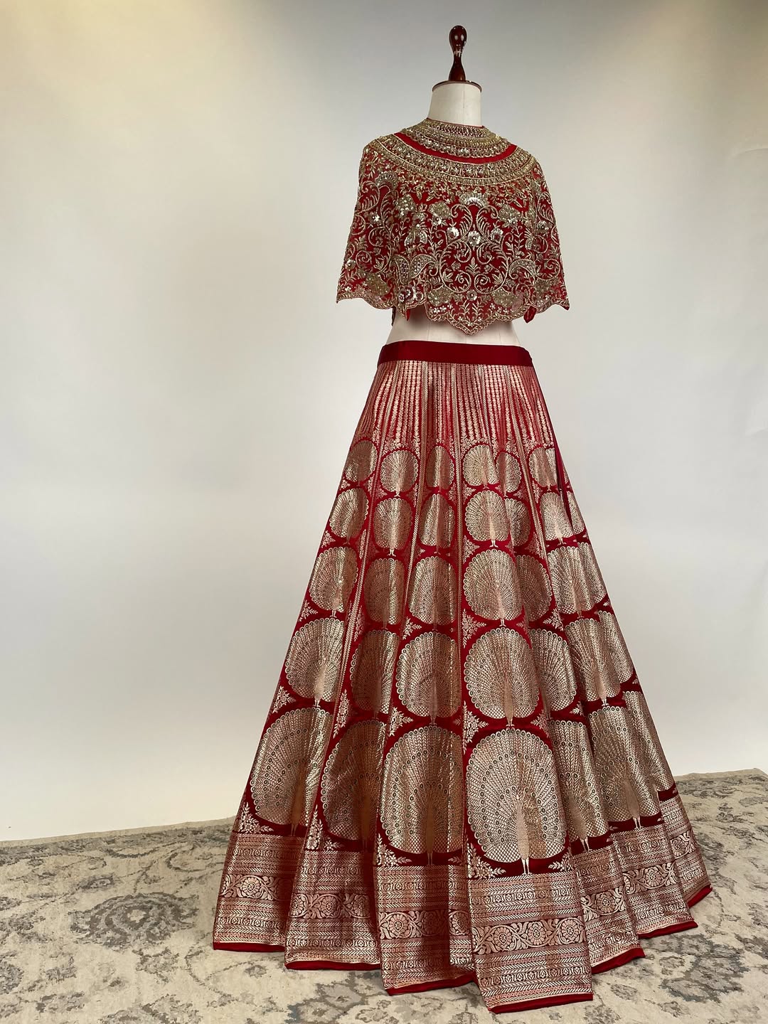 MASHRU SILK HANDLOOM KADWA WEAVE LEHENGA WITH MEENAKARI PAIRED WITH AN EMBROIDERED SHORT CAPE TOP
