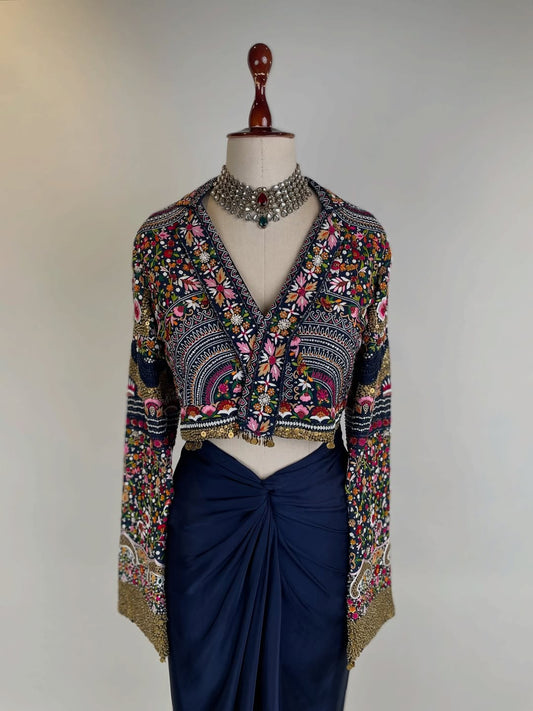 SHORT JACKET IN EKTAAR RESHAM EMBROIDERY WITH BRASS SEQUIN DETAILING AND DRAPED SKIRT