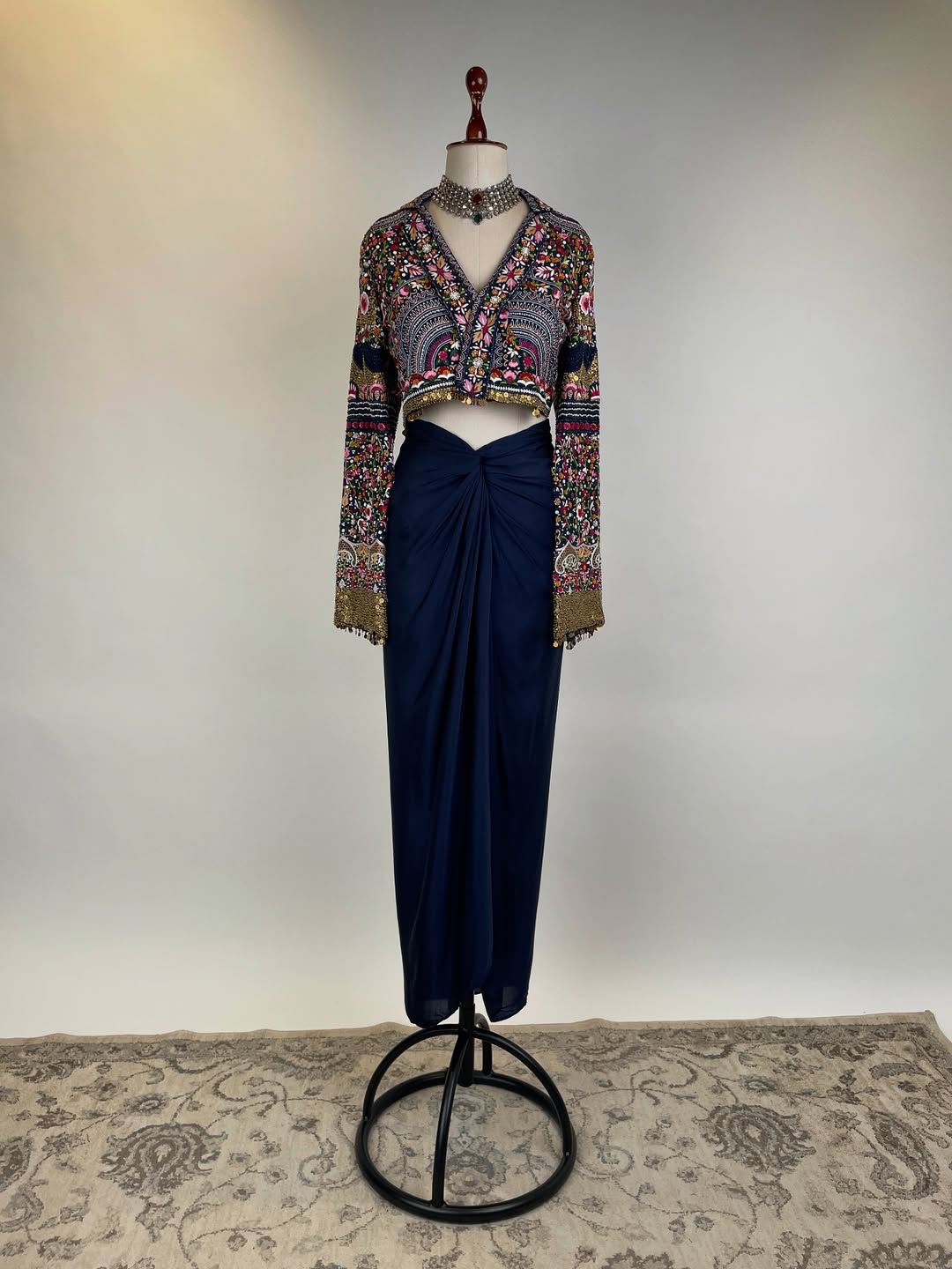 SHORT JACKET IN EKTAAR RESHAM EMBROIDERY WITH BRASS SEQUIN DETAILING AND DRAPED SKIRT