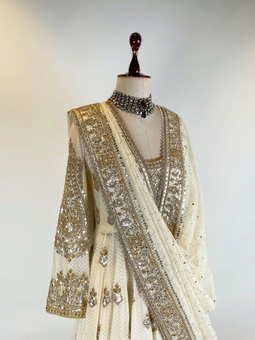 FINE CHANDERI SILK ANARKALI IN TRADITIONAL TECHNIQUES OF GOTA WITH DANKA KAMDANI AND MARODI