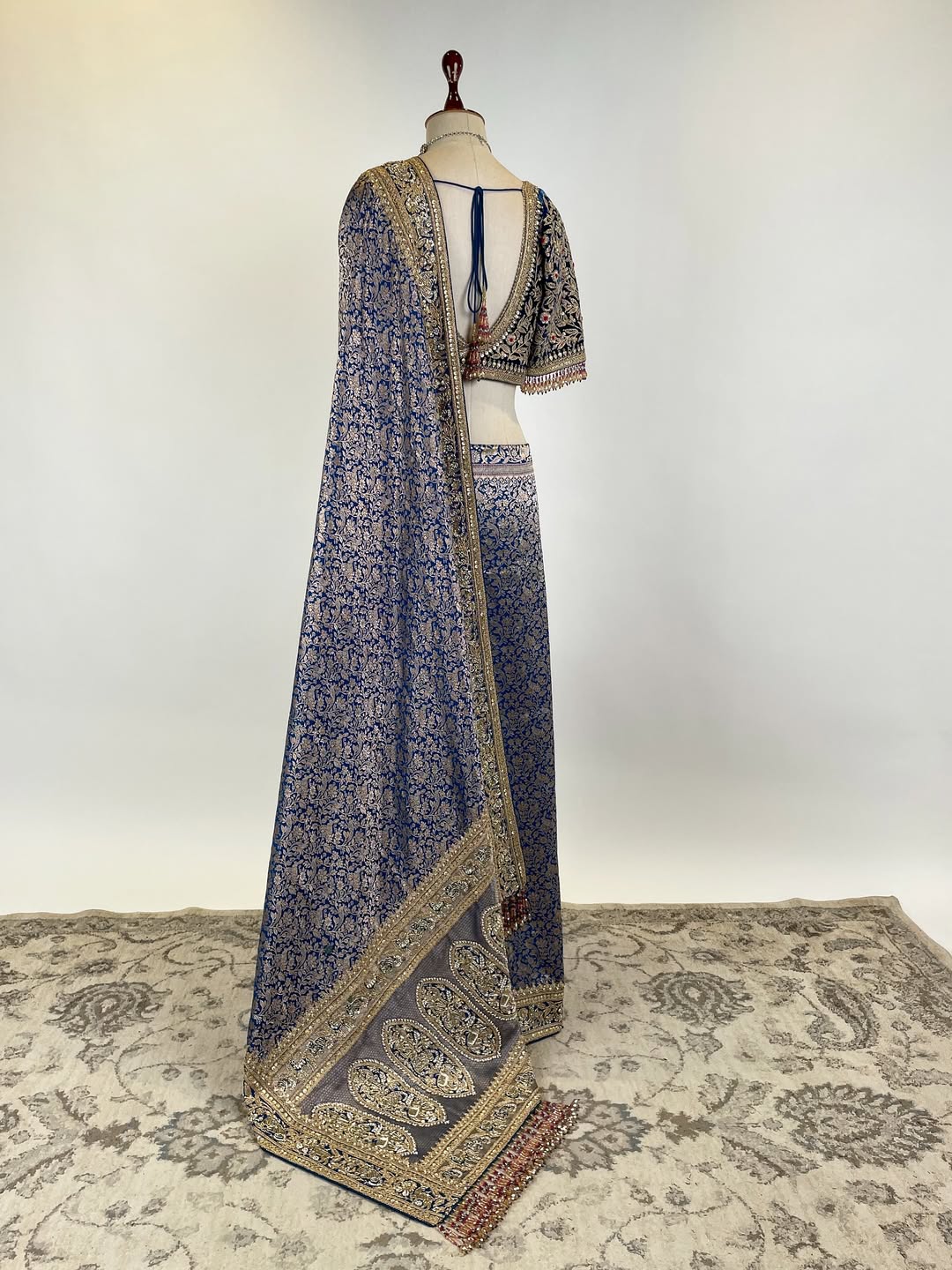 SHIKARGAH BROCADE SAREE FEATURING ZARDOSI AND MARODI BORDER SIGNATURE PALLA PAIRED WITH VELVET MARODI JAAL WORK BLOUSE
