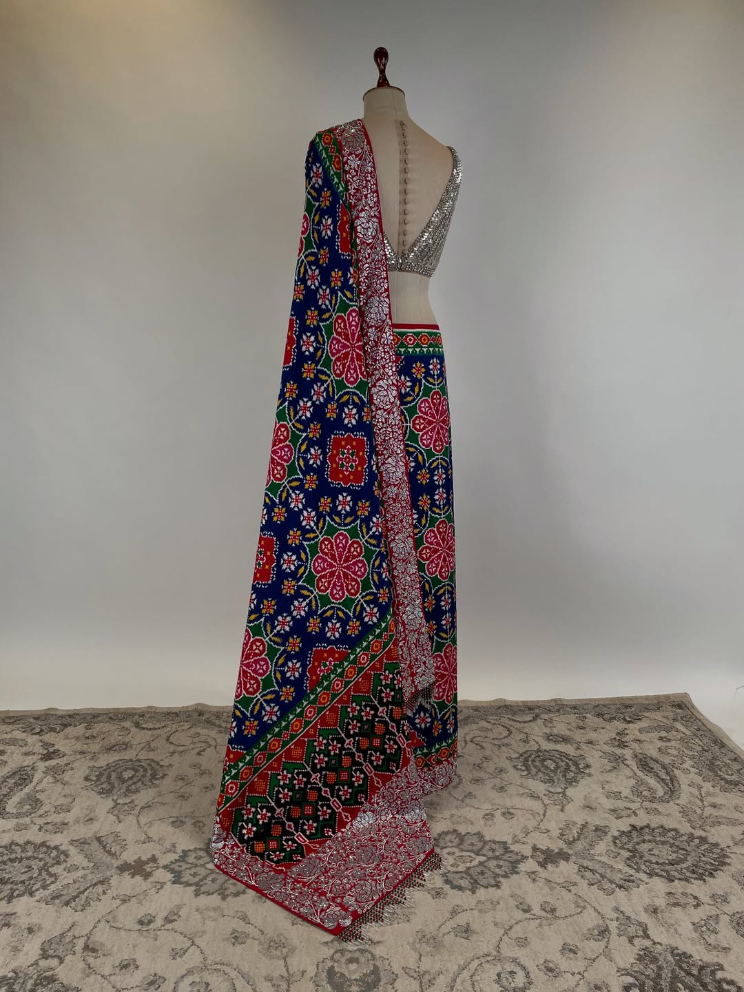 DOUBLE IKAT PATAN PATOLA SAREE WITH SWAROVSKI STONE STUDDED BORDER AND BLOUSE