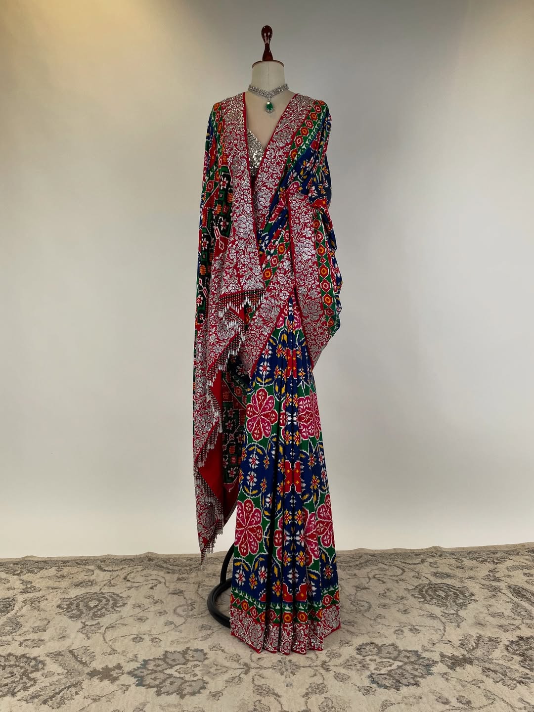 DOUBLE IKAT PATAN PATOLA SAREE WITH SWAROVSKI STONE STUDDED BORDER AND BLOUSE