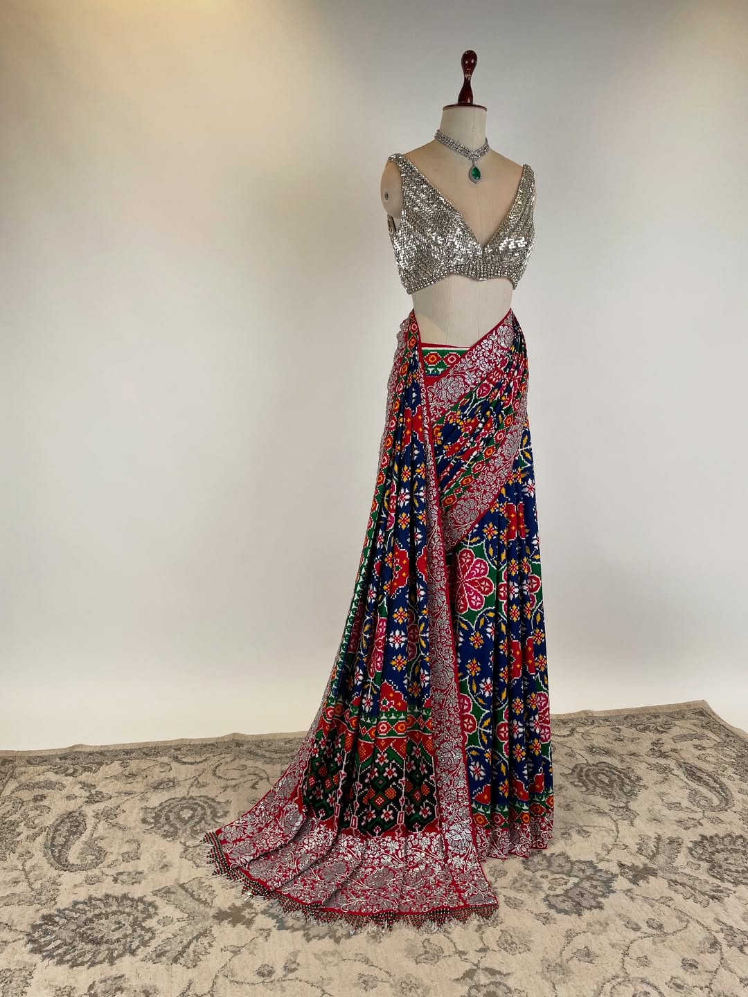 DOUBLE IKAT PATAN PATOLA SAREE WITH SWAROVSKI STONE STUDDED BORDER AND BLOUSE
