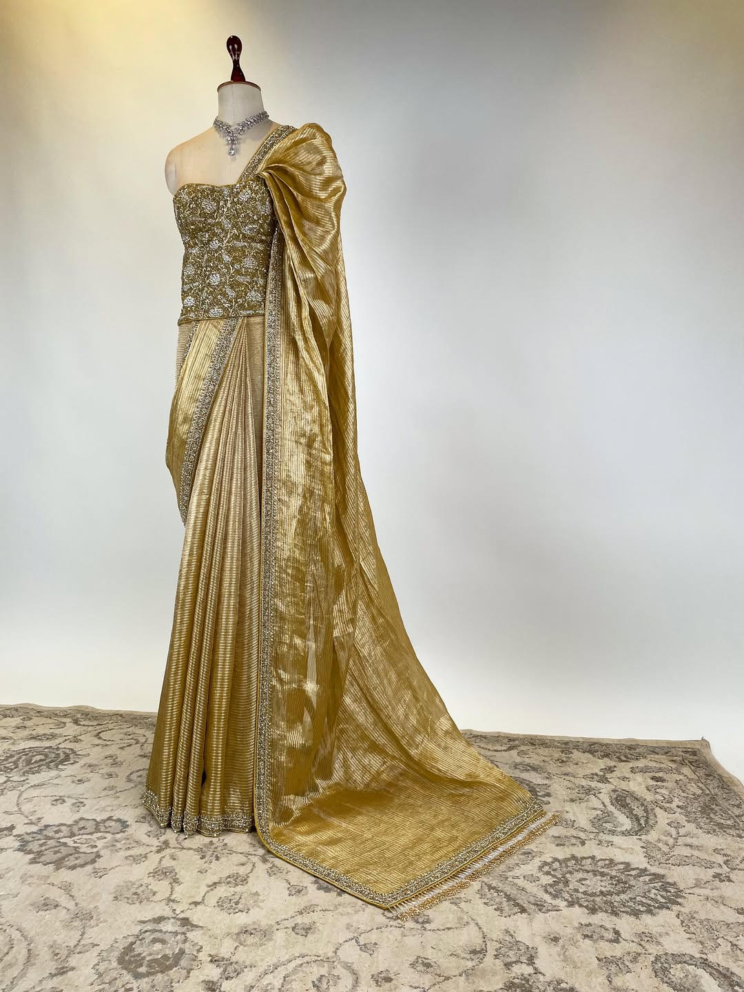 TISSUE SAREE IN BEJWELLED EMBROIDERED BORDERS PAIRED WITH BEJEWELLED CORSET