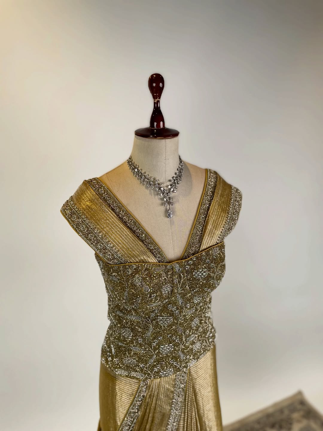 TISSUE SAREE IN BEJWELLED EMBROIDERED BORDERS PAIRED WITH BEJEWELLED CORSET