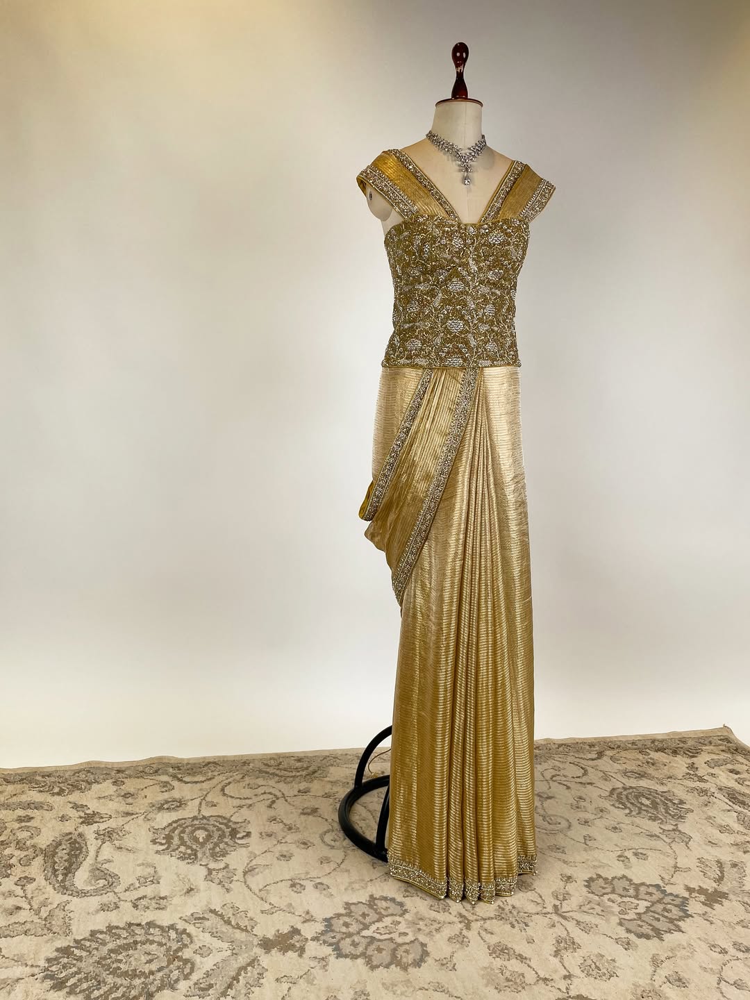 TISSUE SAREE IN BEJWELLED EMBROIDERED BORDERS PAIRED WITH BEJEWELLED CORSET