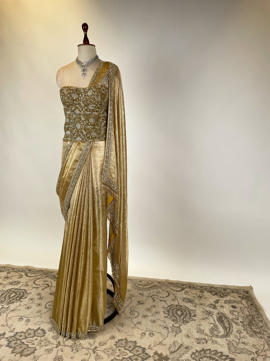 TISSUE SAREE IN BEJWELLED EMBROIDERED BORDERS PAIRED WITH BEJEWELLED CORSET